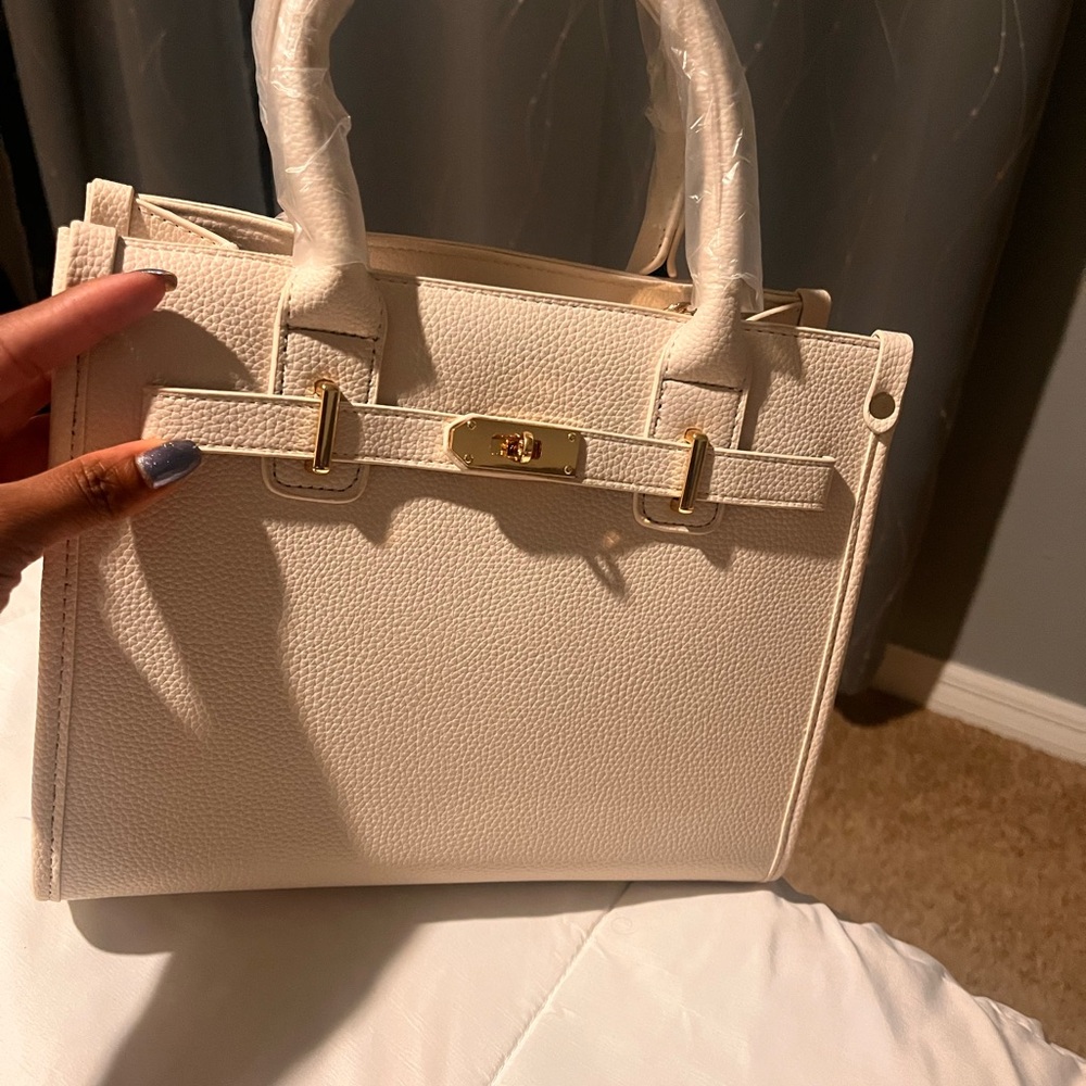 Cream Satchel with Gold Hardware and Structured Design